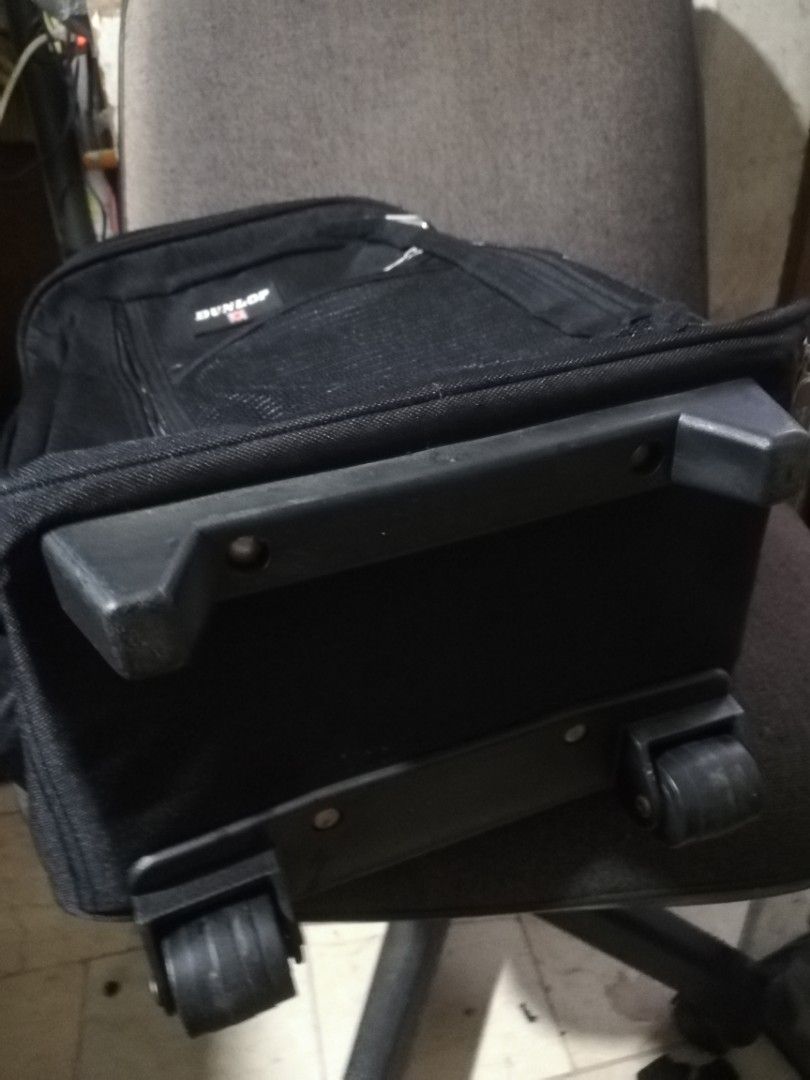 vintage 2wheeled dunlop trolley bag (back pack) (Category: Backpacks) located in Paranaque City. Submitted by 4thestate.surplusan (Listing ID 1441686143, Image 3). Description: dunlop two wheeled trolley bag. 44x 30x 18cm. no issue..