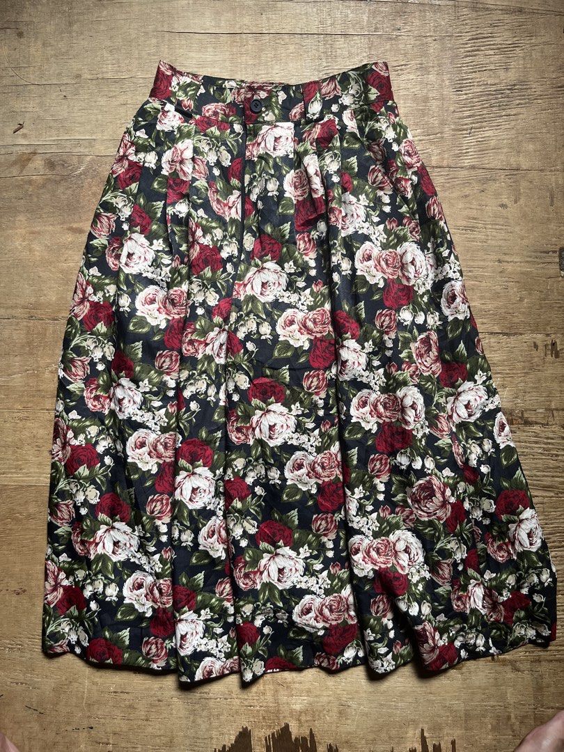 Vintage Floral pleated pants (Category: Skirts) located in Manila. Submitted by gethrifft (Listing ID 1441706790, Image 1). Description: - Dark floral super wide pants (almost like a skirt) - Features red, pink, and white roses on a dark background - Button and zip closure at the front - Pleated design for volume and flow - Ideal for a retro or cottagecore aesthetic.