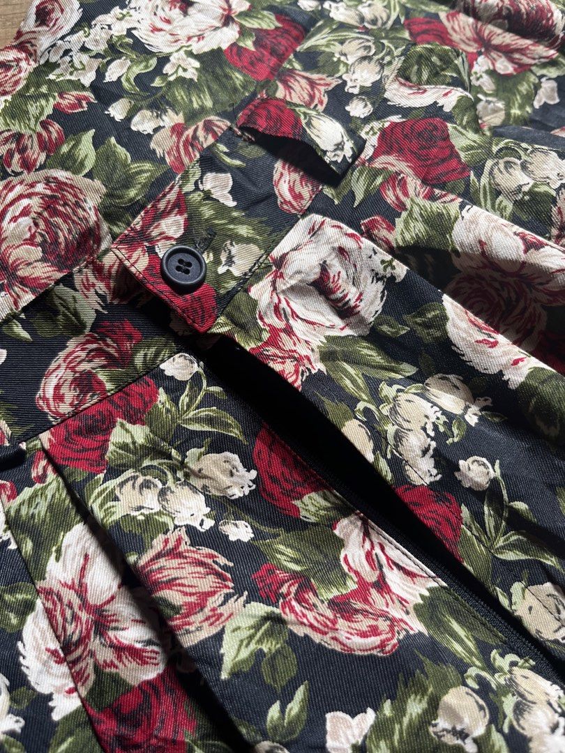 Vintage Floral pleated pants (Category: Skirts) located in Manila. Submitted by gethrifft (Listing ID 1441706790, Image 3). Description: - Dark floral super wide pants (almost like a skirt) - Features red, pink, and white roses on a dark background - Button and zip closure at the front - Pleated design for volume and flow - Ideal for a retro or cottagecore aesthetic.