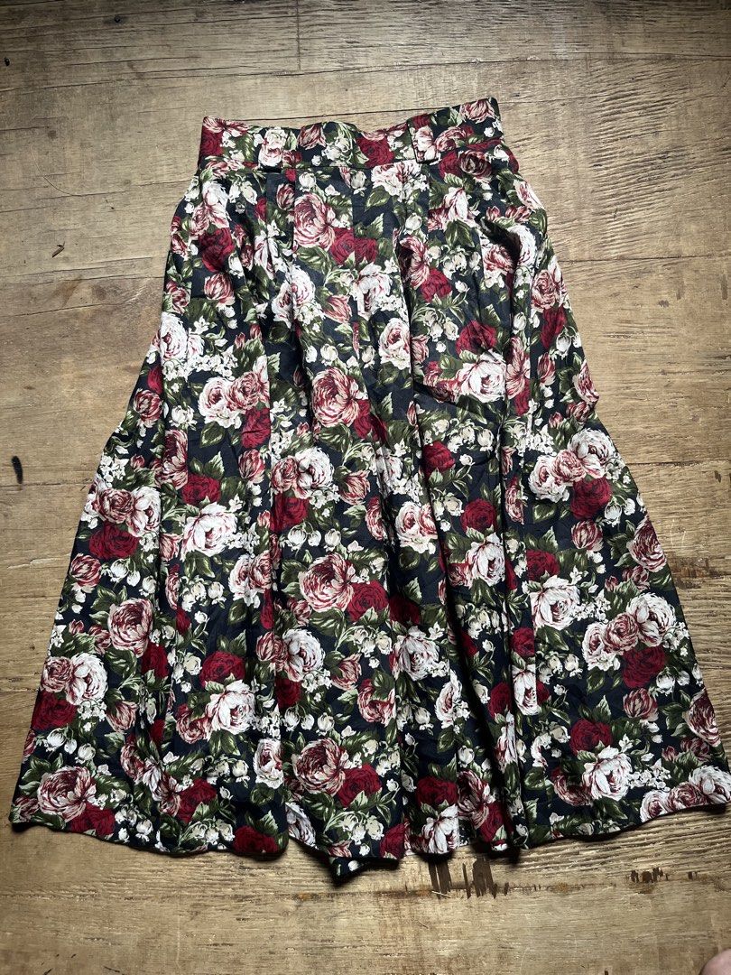 Vintage Floral pleated pants (Category: Skirts) located in Manila. Submitted by gethrifft (Listing ID 1441706790, Image 2). Description: - Dark floral super wide pants (almost like a skirt) - Features red, pink, and white roses on a dark background - Button and zip closure at the front - Pleated design for volume and flow - Ideal for a retro or cottagecore aesthetic.