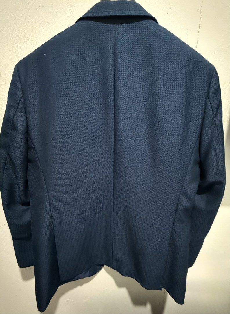 Wall Street Navy Blue Textured Suit (Category: Coats, Jackets and Outerwear) located in San Pedro. Submitted by me-shops (Listing ID 1441693560, Image 2). Description: For rent: 1k with security deposit Navy blue Suit with pants Brand: Wall Stree Size: Fits Medium to Large location: Muntinlupa - Textured fabric all over - Two-button closure - Chest pocket - Two flap pockets at the front - Fully lined interior with inner pockets - Ideal for formal