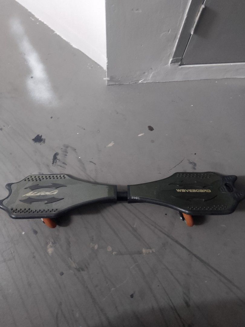 Waveboard (Category: Other Sports Equipment and Supplies) located in Singapore. Submitted by nonameniz (Listing ID 1441645815, Image 3). Description: - Waveboard for sale - Unique, eye-catching design - Textured deck for enhanced grip - Durable wheels for smooth rides - Good, pre-loved condition.