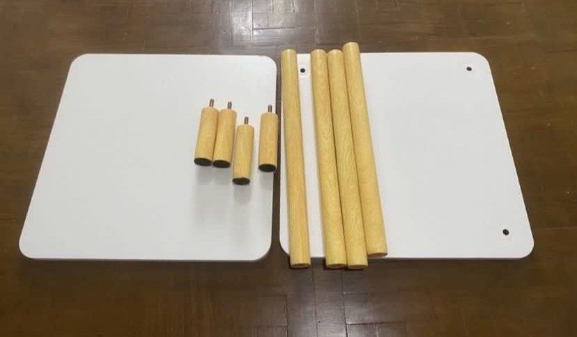 White 2-Tier Side Table with Wooden Legs (Category: Tables & Sets) located in Muntinlupa City. Submitted by bloo_berry (Listing ID 1441648822, Image 2). Description: White 2-layer Nordic Side Table L16” x W16” x H21” Unused, stored Assembled for photo purposes only ₱1,250 SF c/o buyer NO RETURN NO EXCHANGE.