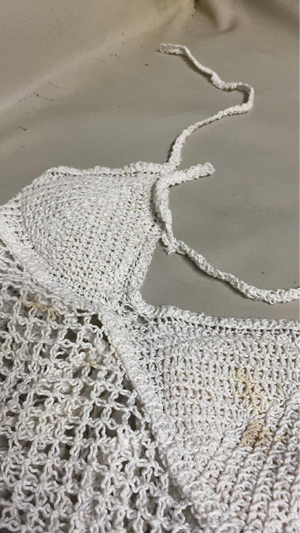 White Crochet Halter Top with Fringe (Category: Sleeveless) located in Manila. Submitted by andy.cc (Listing ID 1441661332, Image 2). Description: - White crochet halter top - Adjustable ties at neck and back - With padding - Slightly damage - Bought for 400 plus .