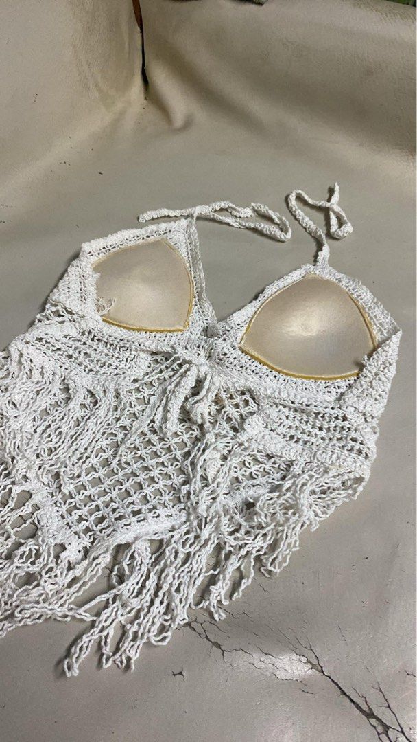 White Crochet Halter Top with Fringe (Category: Sleeveless) located in Manila. Submitted by andy.cc (Listing ID 1441661332, Image 3). Description: - White crochet halter top - Adjustable ties at neck and back - With padding - Slightly damage - Bought for 400 plus .