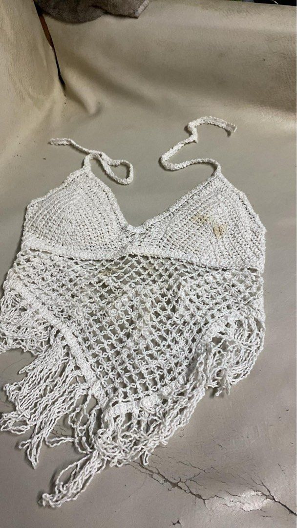 White Crochet Halter Top with Fringe (Category: Sleeveless) located in Manila. Submitted by andy.cc (Listing ID 1441661332, Image 1). Description: - White crochet halter top - Adjustable ties at neck and back - With padding - Slightly damage - Bought for 400 plus .