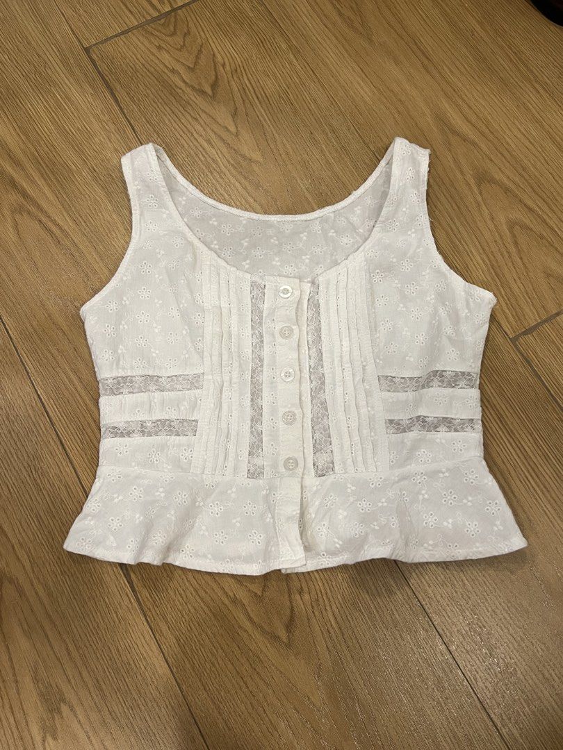 White Eyelet Lace Button-Up Peplum Crop Top (Category: Others Tops) located in Mandaluyong City. Submitted by chelzeee (Listing ID 1441636295, Image 1). Description: cute white top!! rfs: too much clothes.