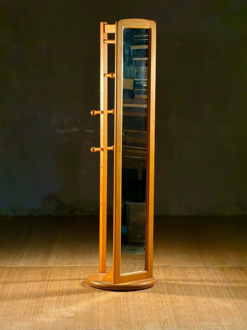 Wooden Coat Rack with Full Length Mirror (Category: Mirrors) located in Valenzuela. Submitted by upcycle_things (Listing ID 1441698658, Image 2). Description: - Wooden coat rack with a tall, slim full-length mirror. - Multiple hooks for convenient hanging of clothes and accessories. - Stable round base for secure placement. - Ideal for entryways, bedrooms, or any space needing style and function..
