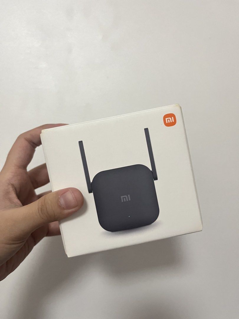 Xiaomi Mi Wi-Fi Range Extender Pro (Category: Networking) located in Manila. Submitted by prelovedbycari (Listing ID 1441709522, Image 3). Description: - Xiaomi Mi Wi-Fi Range Extender Pro (Black) - Boosts and extends your Wi-Fi signal - Plugs directly into a wall socket - Easy setup and use - Improves Wi-Fi coverage in more rooms.