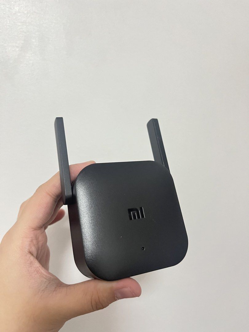 Xiaomi Mi Wi-Fi Range Extender Pro (Category: Networking) located in Manila. Submitted by prelovedbycari (Listing ID 1441709522, Image 1). Description: - Xiaomi Mi Wi-Fi Range Extender Pro (Black) - Boosts and extends your Wi-Fi signal - Plugs directly into a wall socket - Easy setup and use - Improves Wi-Fi coverage in more rooms.