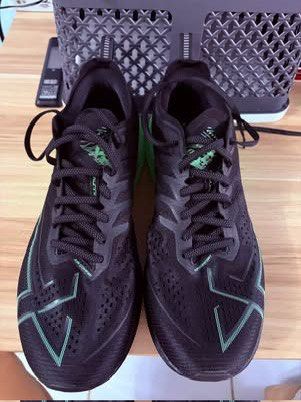 Xtep One Piece Modeling 3.0 - Black Green (Category: Sneakers) located in Pasig City. Submitted by entertrou (Listing ID 1441778939, Image 1). Description: - Brand: XTEP - Color: Black with Neon Green accents - Material: Lightweight and breathable mesh upper - Features: Reflective details on laces and heel - Ideal for: Running.