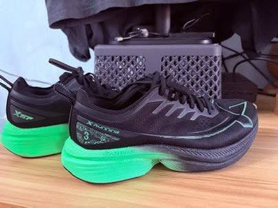 Xtep One Piece Modeling 3.0 - Black Green (Category: Sneakers) located in Pasig City. Submitted by entertrou (Listing ID 1441778939, Image 2). Description: - Brand: XTEP - Color: Black with Neon Green accents - Material: Lightweight and breathable mesh upper - Features: Reflective details on laces and heel - Ideal for: Running.