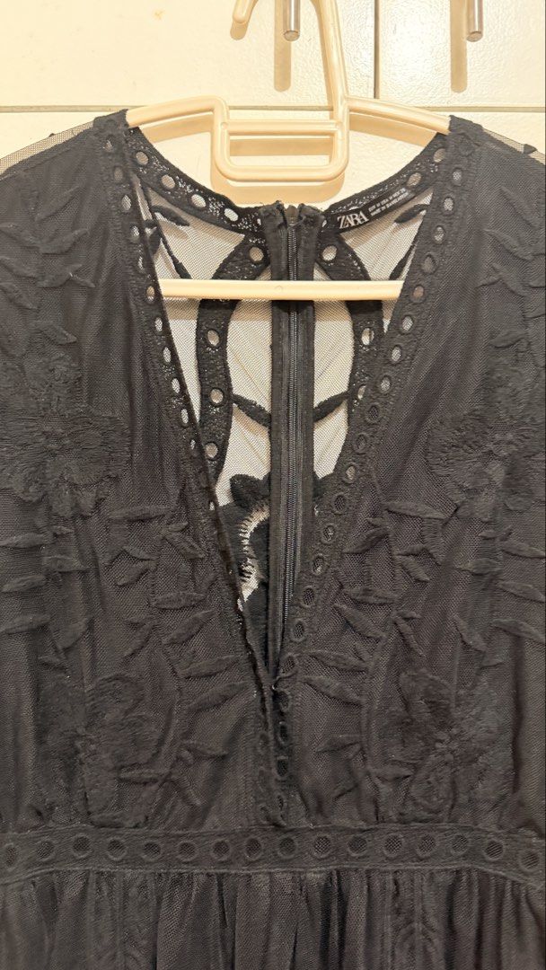 Zara Black Lace V-Neck Romper (Category: Rompers) located in San Pablo. Submitted by rioczarina (Listing ID 1441773334, Image 3). Description: - Zara Black Lace Romper - Size: Medium (M) - V-neckline - Cut-out detail at the back - Short sleeves with flared cuffs - Elasticated waist for a comfortable fit - Ideal for a night out or special occasions.