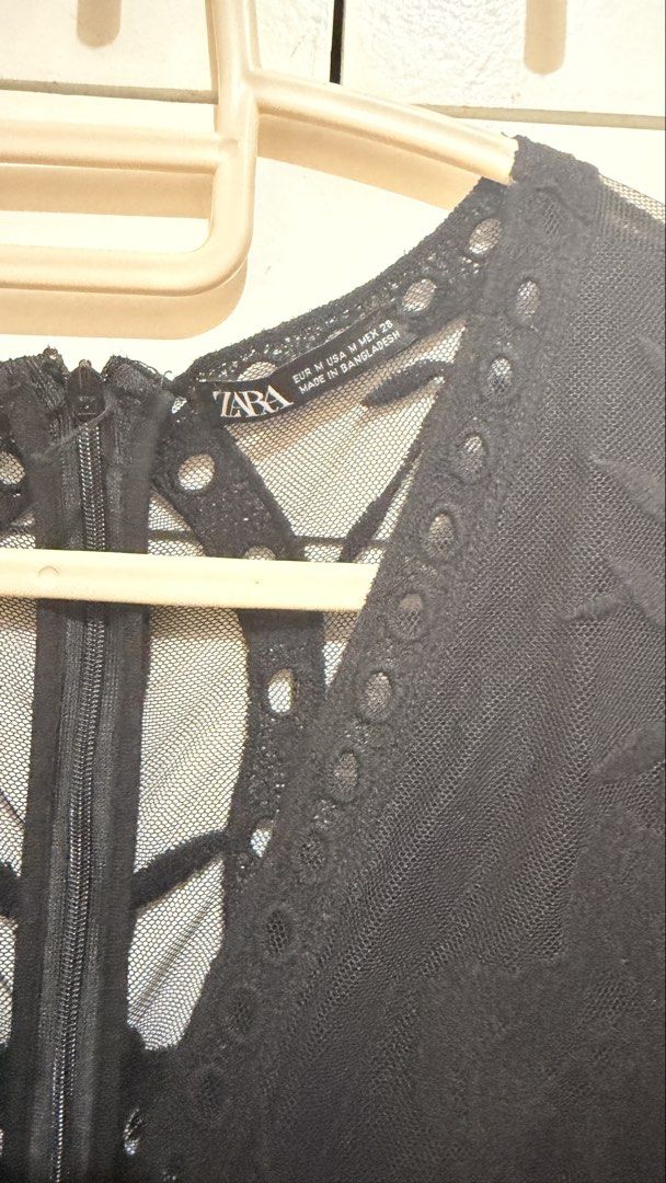 Zara Black Lace V-Neck Romper (Category: Rompers) located in San Pablo. Submitted by rioczarina (Listing ID 1441773334, Image 2). Description: - Zara Black Lace Romper - Size: Medium (M) - V-neckline - Cut-out detail at the back - Short sleeves with flared cuffs - Elasticated waist for a comfortable fit - Ideal for a night out or special occasions.