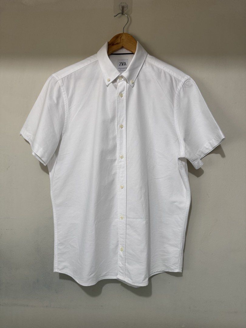 ZARA MAN WHITE SHORT SLEEVE POLO (Category: Formal Shirts) located in Pasig City. Submitted by _king.declutter (Listing ID 1441660103, Image 1). Description: FOR SALE ONLY NO SWAP OR TRADE🚩 ZARA MAN SHORT SLEEVE POLO WHITE MEDIUM-LARGE GOOD CONDITION 999 ONLY 2500 ORIGINAL PRICE DELIVERY VIA LALAMOVE GRAB TOKTOK J&T LBC PICK UP MEET UP ORTIGAS PASIG ONLY .