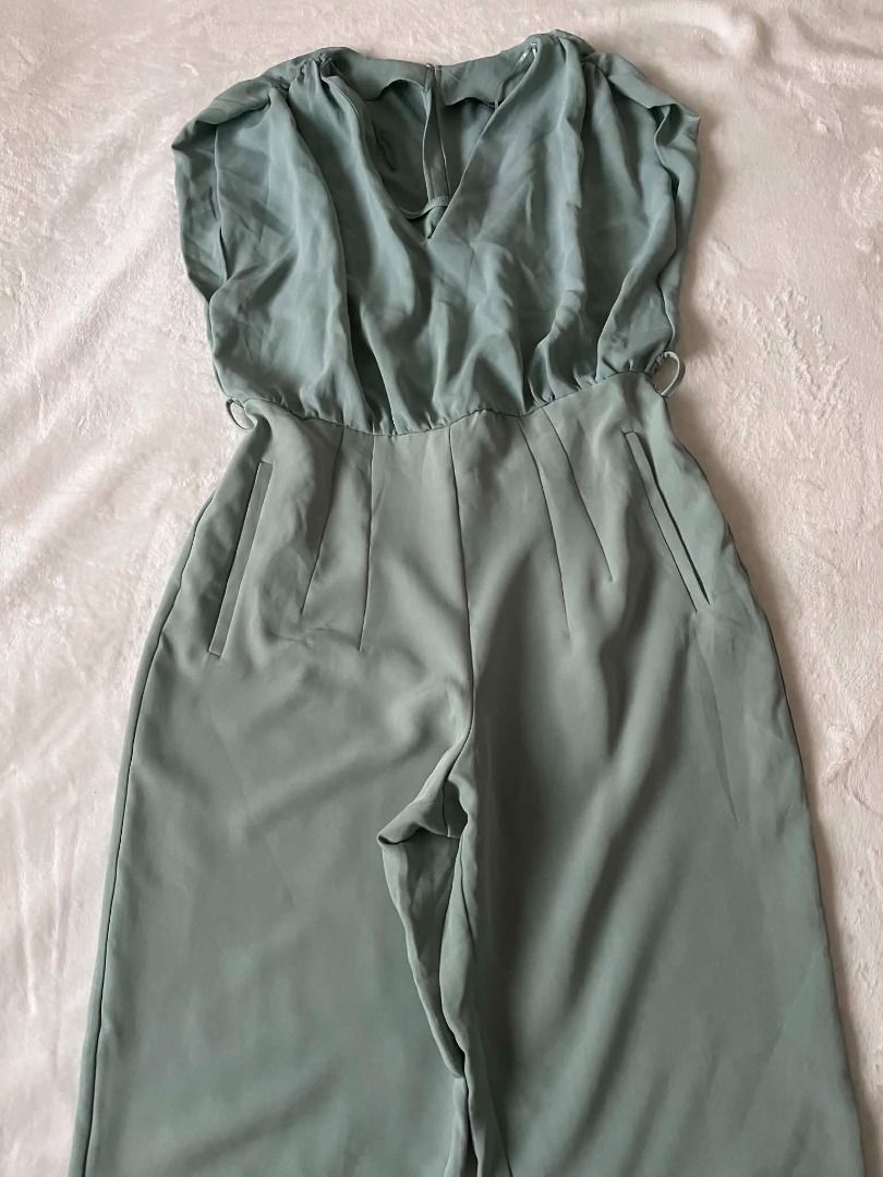 Zara sage green jumpsuit (Category: Jumpsuits) located in Pasig City. Submitted by closet_reframe (Listing ID 1441615095, Image 2). Description: Worn once, flows nice. no visible issues, quality is good. very elegant. Bag and shoes are also for sale! S: M.