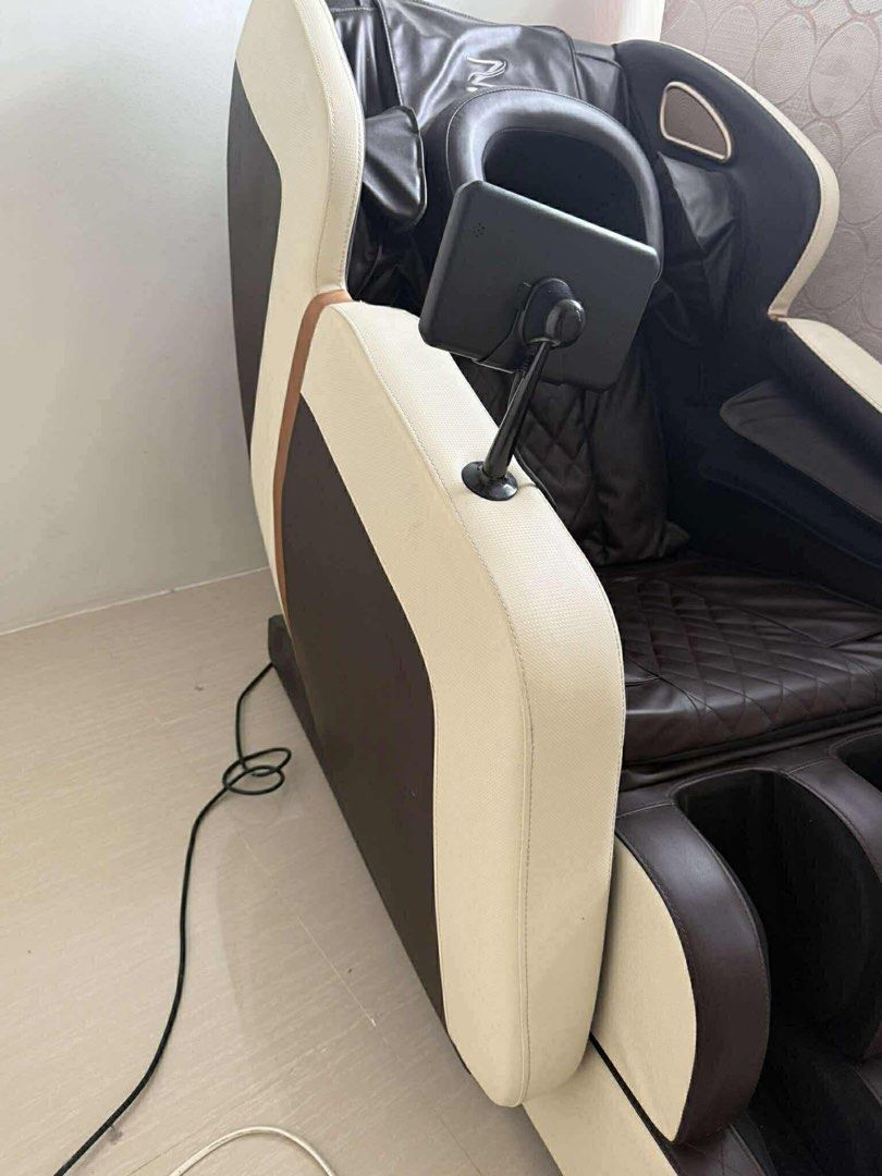 ZION MASSAGE CHAIR (Category: Massage Devices) located in Antipolo. Submitted by arianjuliaaaaaa (Listing ID 1441721574, Image 1). Description: - Timer: Adjustable up to a maximum of 30 minutes - 5 Automatic modes - 2D massage manipulator with fixed-point rollers and a zero-gravity recline system. - Heating Function - Additional Features: Built-in Bluetooth speakers, intelligent touch screen display, and sole rolling massage. - Manual leg extensi