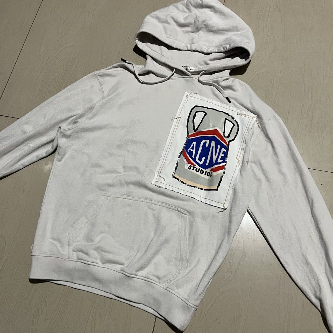 Acne Studios Ceramic Patch Hooded Sweatshirt (Category: Coats, Jackets and Outerwear) located in Lucena. Submitted by brkrobert (Listing ID 1446815248, Image 1). Description: - White Acne Studios hoodie - Unique hand-painted Acne Studios logo patch on chest - Drawstring hood - Front pocket - Ideal for casual wear - xs - medium - minimal stains front i think unnoticeable naman sya when worn - excellent panaman condition overall sobrang sikip pa ri