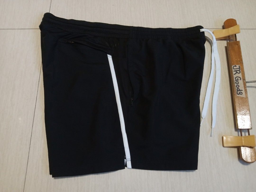 Adidas Black Shorts with White Stripes (Category: Activewear) located in Tanay. Submitted by jrgoods (Listing ID 1446796352, Image 2). Description: ADIDAS running Large above the knee Waistline 34-36 length 14.5 Good as new condition 599+ship Tanay Rizal location Shipping Nationwide - White side stripes - Elastic waistband with drawstring - Zippered pockets - Comfortable material - Ideal for sports or casual wear.