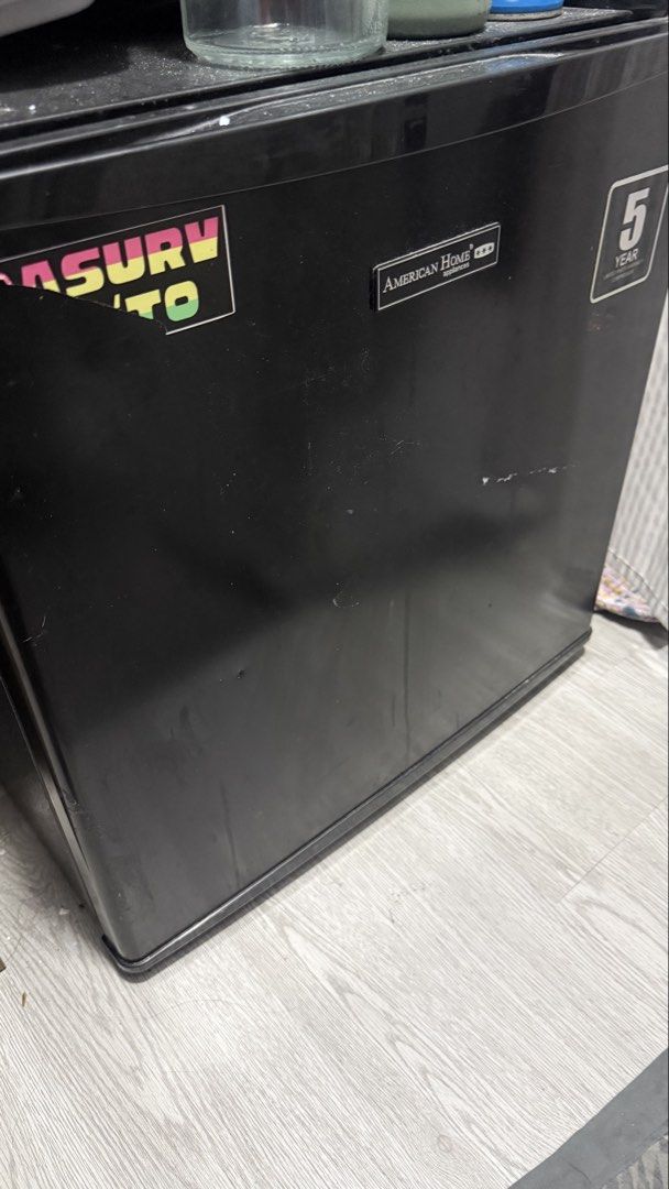 American Home Mini Fridge Black (Category: Refrigerators and Freezers) located in Manila. Submitted by viegdl (Listing ID 1446901819, Image 1). Description: -Minor scratches on the exterior, but works perfectly -Natanggal door nung freezer pero working lahat RFS: Moving out sa dorm .