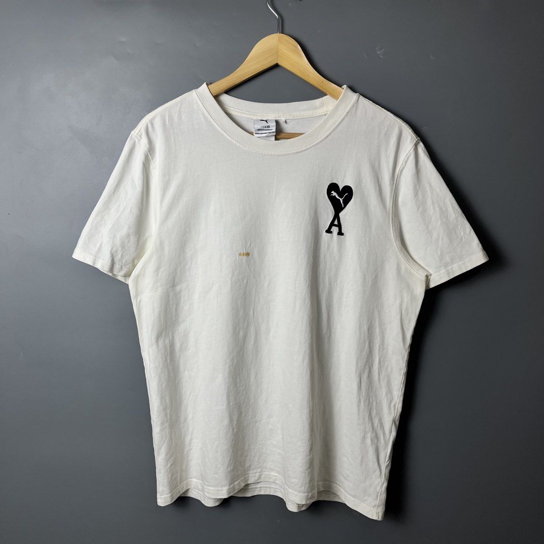 Ami x Puma (Category: Tshirts & Polo Shirts ) located in Dagupan City. Submitted by thrifted_by.pilott (Listing ID 1446793198, Image 1). Description: Size/Dimes: Length 26 Width 20 Issue: stain need wash Very Good Condition Complete tags Color may very due to lighting Color Rate: 10/10 Price: ₱ 699 + sf sustainable, stylish, and budget-friendly! DM for more pics or questions..
