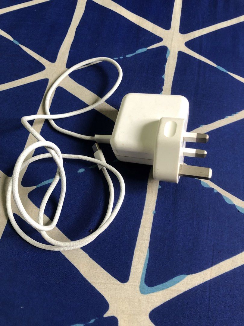 Apple 35W dual type C power adapter (Category: Chargers & Cables) located in Quezon City. Submitted by markgolveo (Listing ID 1446742278, Image 1). Description: Apple 35W dual type C power adapter Tested both type c ports working properly fast charging Signs of wears on outer shell.