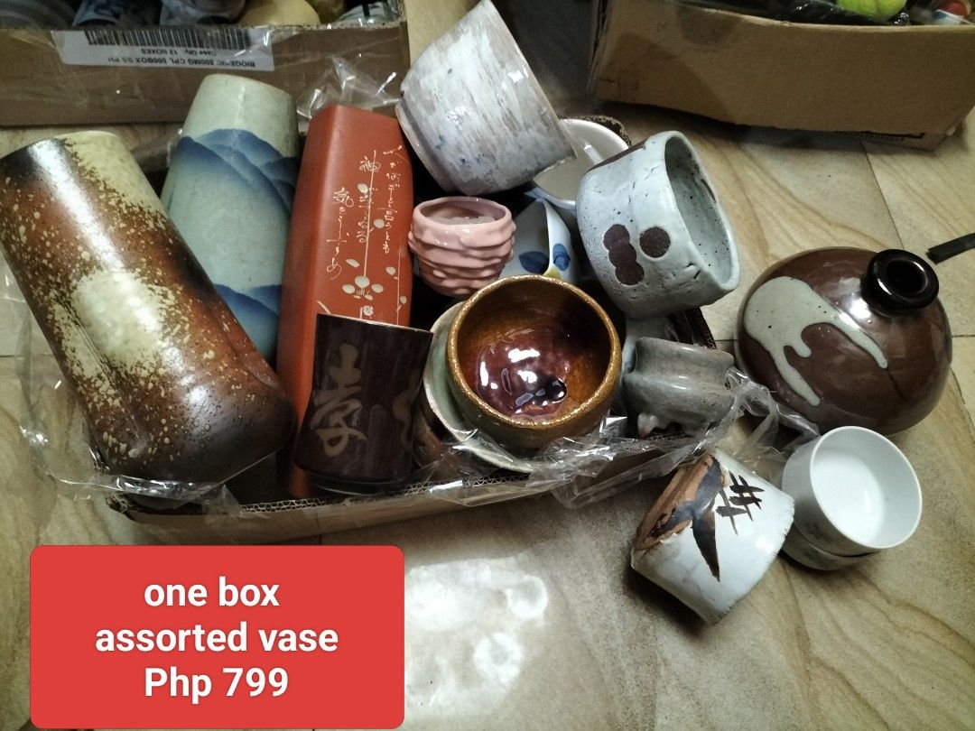 Assorted Ceramic Vases and Pots - One Box (Category: Vases & Decorative Bowls) located in Cainta. Submitted by banzvi73 (Listing ID 1446908689, Image 1). Description: - Assorted box of ceramic vases and pots - Includes various sizes and designs - Mix of tall, slender, and short, wide styles - Ideal for home decor or as a thoughtful gift - All items packed together; price is for the entire box.