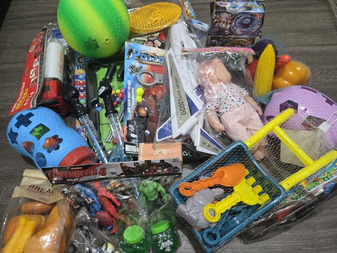 Assorted Kid Toys (Take All) Set 4 (Category: Kids Toys) located in Manila. Submitted by me_ann1016 (Listing ID 1446728205, Image 1). Description: - Big bundle of kids toys! - Includes: avenger action figures, baby doll, ball, bubbles, toy guns, airplane, beach set (shovel & rake). - Great for playtime and parties. - Lots of fun items included! RFS: Store is closing.