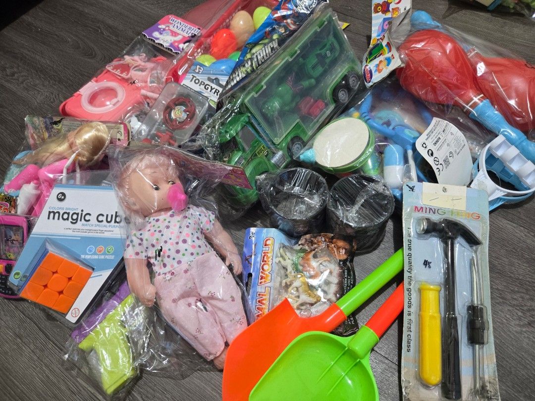 Assorted Toys Bundle (Set 5) (Category: Kids Toys) located in Manila. Submitted by me_ann1016 (Listing ID 1446728823, Image 1). Description: - Assorted toy bundle perfect for kids' playtime. - Includes: baby doll, magic cube, toy tool set, toy shovel and pail. - Also includes other small assorted toys. - All items are in original packaging RFS: Store is closing.