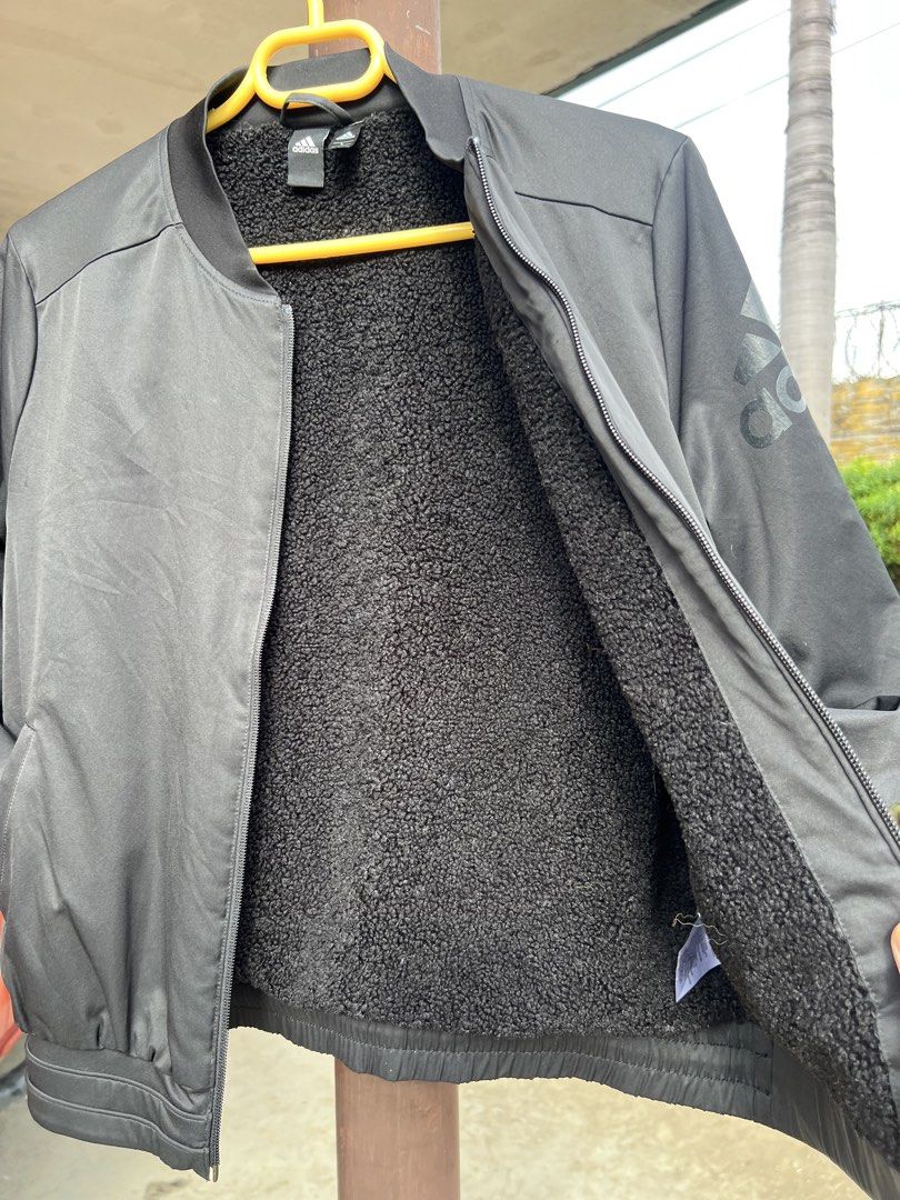 Adidas Sherpa-Lining Jacket Women (Category: Coats, Jackets and Outerwear) located in San Jacinto. Submitted by rex_finds (Listing ID 1446807379, Image 3). Description: Adidas Sherpa Bomber Jacket Size: Large Boxy Fit Dimes: 16.5x22 inches Arm length: 23.5 inches Pockets with zipper No issue Price is negotiable Feel free to give a reasonable offer PM for more info.