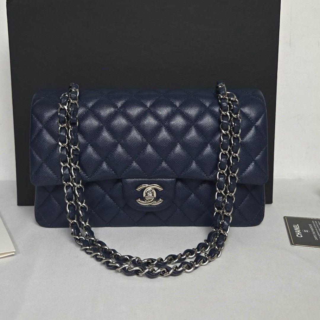 Authentic Chanel classic medium Navy Caviar s24 (Category: Luxury Bags & Wallets) located in Marikina City. Submitted by aussiemaan (Listing ID 1434044181, Image 1). Description: classic medium navy Caviar series24💞 6.30 card dust box booklet almost new rank SA Free pabitbit Korea - fully paid before paship Pinas.