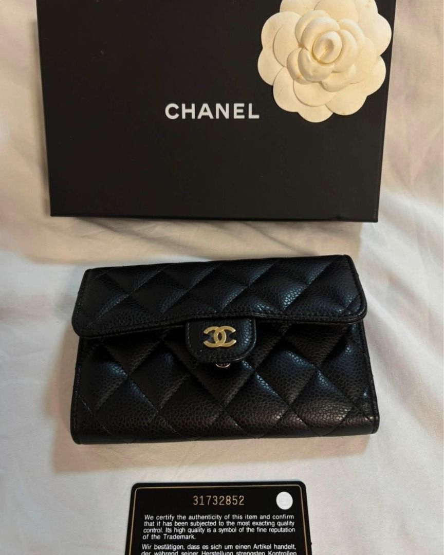 Authentic Chanel Tri-fold Classic Flap wallet (Category: Luxury Bags & Wallets) located in Taguig. Submitted by curatedbyb.ph (Listing ID 1446868029, Image 1). Description: Authentic Chanel Tri-fold Classic Flap wallet Unused condition- medium size series 31 Inclusions: cards, box, dustbag.