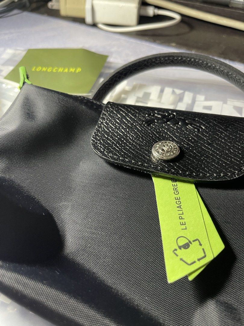 AUTHENTIC LONGCHAMP LE PLIAGE GREEN POUCH W/ HANDLE (BLACK) (Category: Shoulder Bags) located in Bauang. Submitted by doc_jay01 (Listing ID 1446832355, Image 2). Description: ORIGINAL/AUTHENTIC BRAND NEW/NEVER USED BOUGHT FROM LONDON SRP: 6,000 (85 EURO) PRICE: 4,499 SLIGHTLY NEGOTIABLE J&T/LBC AT BUYER’S EXPENSE LBC COD AVAILABLE (DP 50%) PM FOR MORE DETAILS.