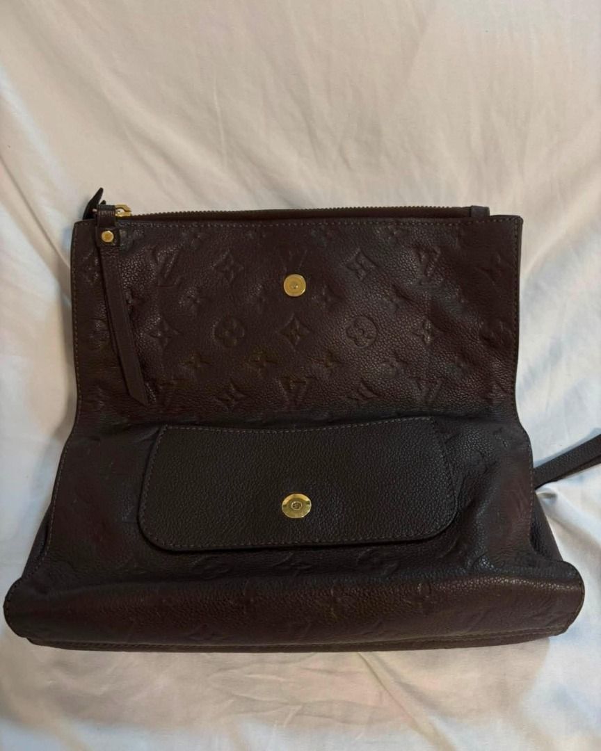 Authentic Louis Vuitton Clutch bag (Category: Luxury Bags & Wallets) located in Taguig. Submitted by curatedbyb.ph (Listing ID 1446873043, Image 2). Description: Authentic Louis Vuitton Clutch Bag In good condition with fading on zippers Inclusions: dustbag, care cards.