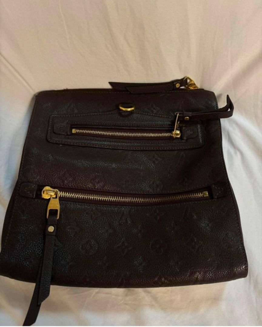 Authentic Louis Vuitton Clutch bag (Category: Luxury Bags & Wallets) located in Taguig. Submitted by curatedbyb.ph (Listing ID 1446873043, Image 3). Description: Authentic Louis Vuitton Clutch Bag In good condition with fading on zippers Inclusions: dustbag, care cards.