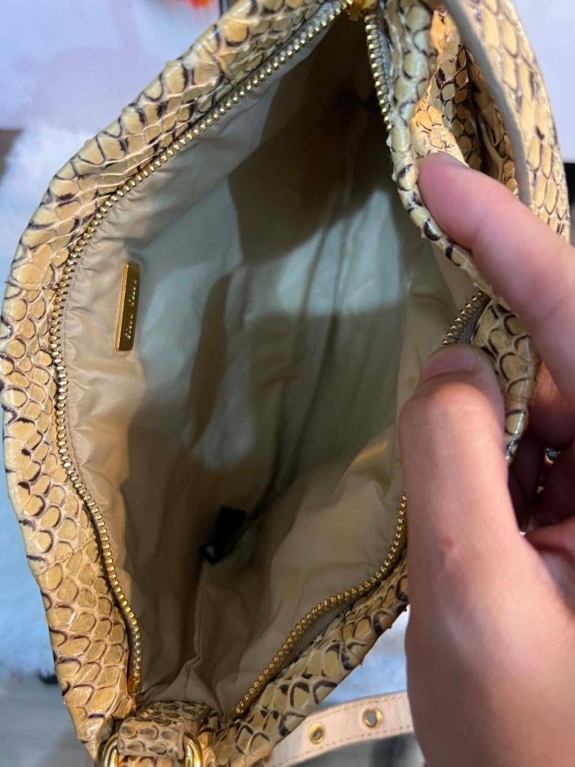 Authentic Miu Miu Black Python Small Kili Bag (Category: Luxury Bags & Wallets) located in Marikina City. Submitted by aussiemaan (Listing ID 1443140485, Image 3). Description: Authentic 💞 6.30.59 preloved good condition Lalamove ready Rank A Kasya promax (small) Bag only.
