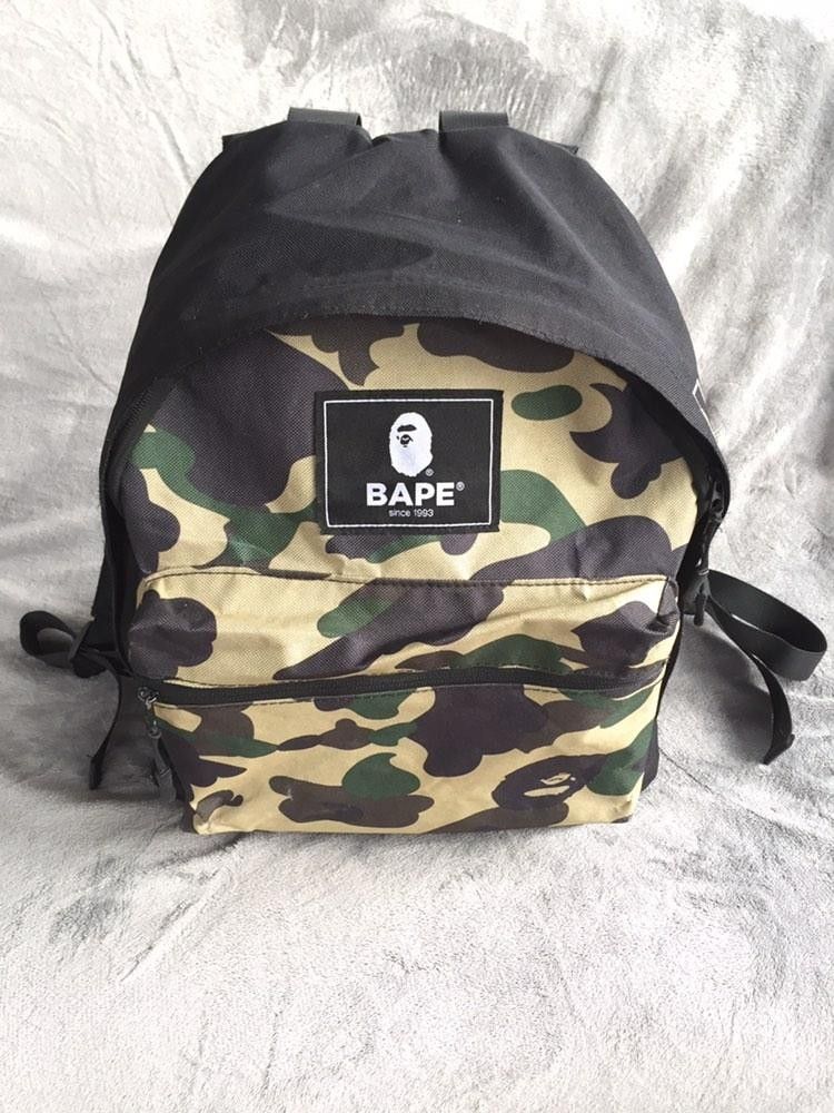 BAPE 1st Camo Backpack (Category: Backpacks) located in Manila. Submitted by niggzreyno51476 (Listing ID 1446789235, Image 3). Description: - Iconic BAPE 1st camo pattern - Front zip compartment for easy access - Comfortable padded shoulder straps - Signature BAPE logo patch - Made from durable canvas material - Ideal for everyday use and carrying your essentials.
