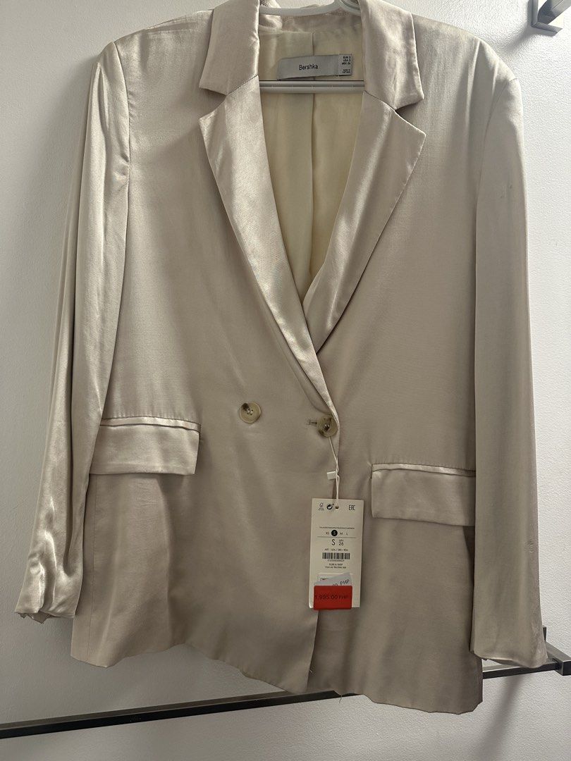 Bershka Satin Double-Breasted Blazer (Category: Coats, Jackets and Outerwear) located in Marikina City. Submitted by saavi94 (Listing ID 1446893223, Image 1). Description: - Bershka satin blazer - Double-breasted with two buttons - Newly washed MOP: GCash MOD: Gogo Xpress.