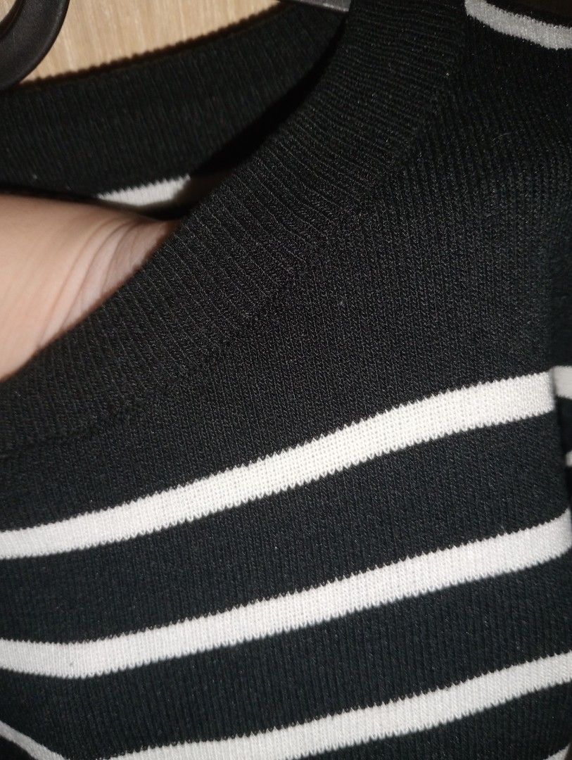 Black and White Striped Cropped Knit Top (Category: Blouses) located in Makati City. Submitted by e937d50fd52094c564e0cdf9049840 (Listing ID 1446750994, Image 3). Description: - Cute black and white striped knit top - Short sleeves - Cropped length - Ribbed neckline and hem - Estimated size: Small to Medium - Ideal for casual wear - Easily pairs with jeans or shorts.
