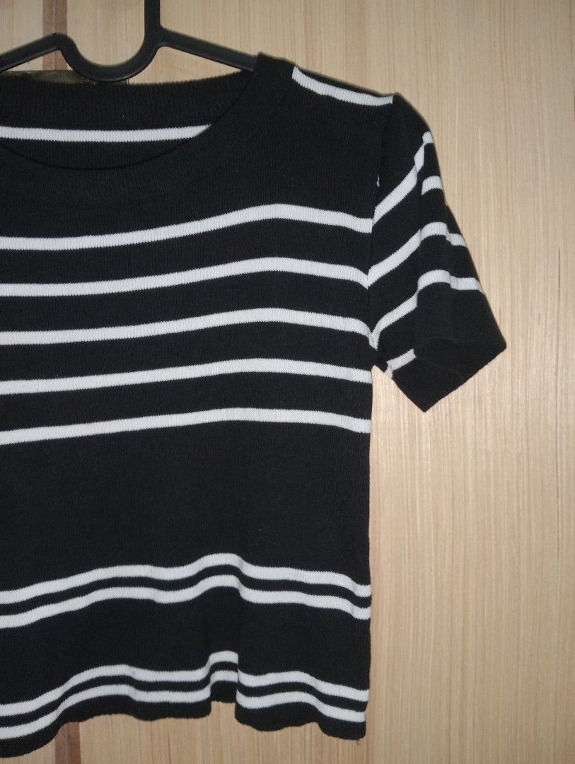 Black and White Striped Cropped Knit Top (Category: Blouses) located in Makati City. Submitted by e937d50fd52094c564e0cdf9049840 (Listing ID 1446750994, Image 2). Description: - Cute black and white striped knit top - Short sleeves - Cropped length - Ribbed neckline and hem - Estimated size: Small to Medium - Ideal for casual wear - Easily pairs with jeans or shorts.