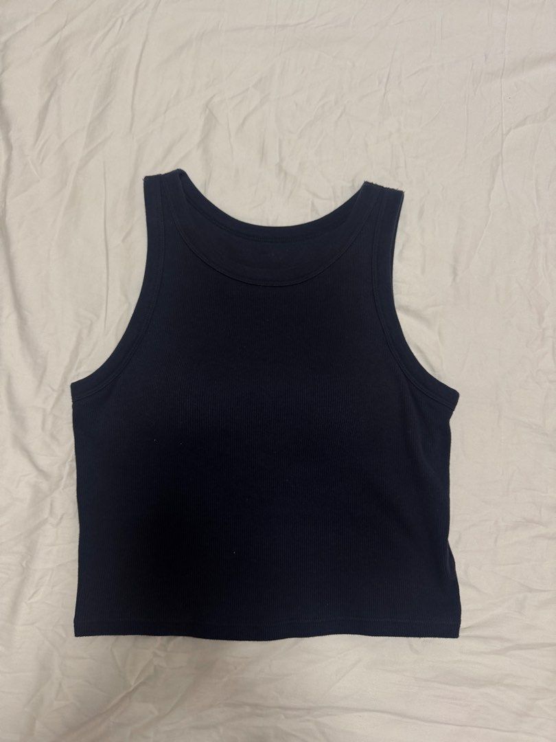 Black basic tops (Category: Sleeveless) located in Singapore. Submitted by prettydarncoool (Listing ID 1446810601, Image 2). Description: $5 each First pic is from h&m and not padded 2nd & 3rd pics are padded black tops from uniqlo selling to clear space pm for detailed sizing & description get all $3 for $10.