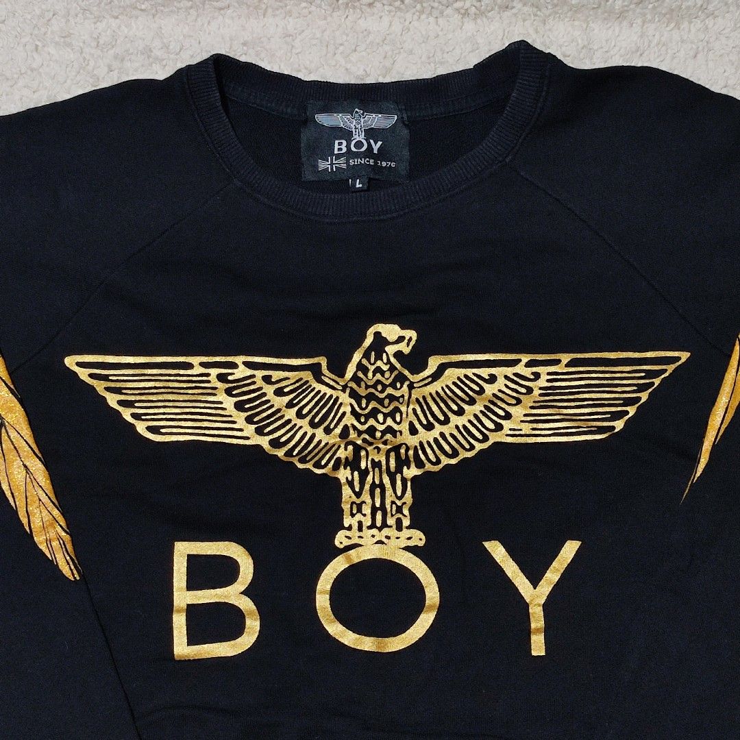 BOY London Black Gold Eagle Wings Sweatshirt (Category: Coats, Jackets and Outerwear) located in Manila. Submitted by anthonig (Listing ID 1446809357, Image 2). Description: Length: 25 inches Width: 21 inches Price: 400 pesos Condition: 9.4/10 Issues: neckline PM if interested or for inquiries Meetups within MANILA only Can do shipping at buyers expense .