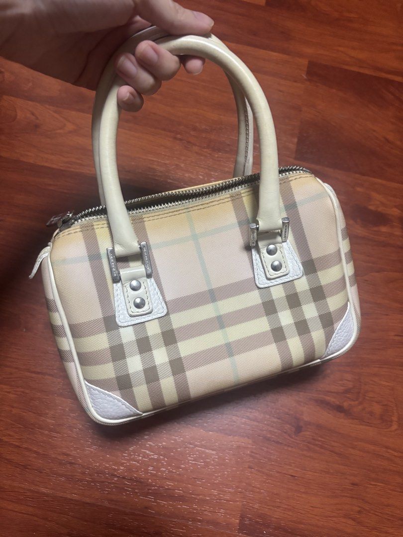 Burberry Nova Check Mini Bag (negotiable) (Category: Luxury Bags & Wallets) located in Pasig City. Submitted by adiuhsa (Listing ID 1446893335, Image 1). Description: Burberry Nova Check Mini Bag (Pink Plaid) — negotiable - legit - from the US - yellowing of item is visible - interior and exterior still intact .