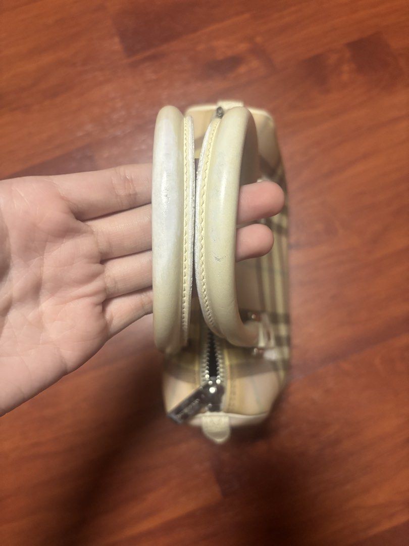 Burberry Nova Check Mini Bag (negotiable) (Category: Luxury Bags & Wallets) located in Pasig City. Submitted by adiuhsa (Listing ID 1446893335, Image 2). Description: Burberry Nova Check Mini Bag (Pink Plaid) — negotiable - legit - from the US - yellowing of item is visible - interior and exterior still intact .