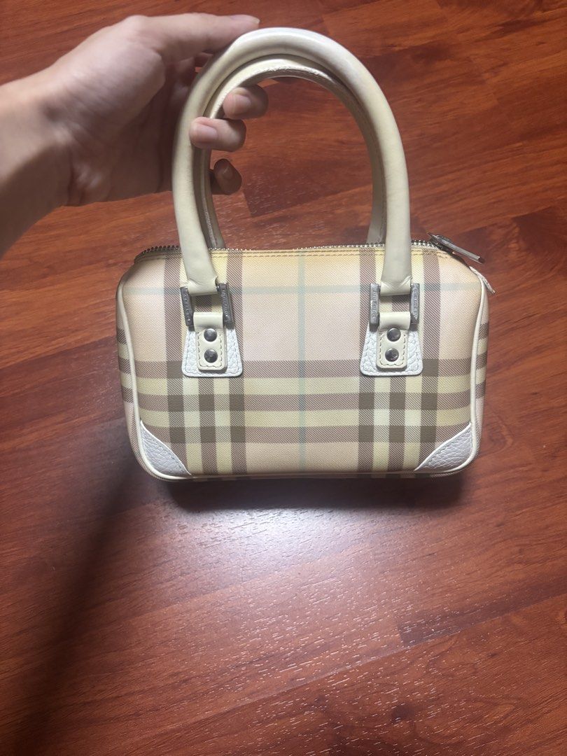Burberry Nova Check Mini Bag (negotiable) (Category: Luxury Bags & Wallets) located in Pasig City. Submitted by adiuhsa (Listing ID 1446893335, Image 3). Description: Burberry Nova Check Mini Bag (Pink Plaid) — negotiable - legit - from the US - yellowing of item is visible - interior and exterior still intact .