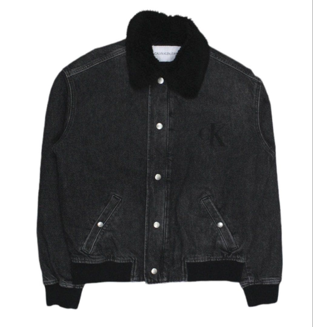 Calvin Klein Black Denim Jacket and Jeans Set (Category: Coats, Jackets and Outerwear) located in Cagayan de Oro. Submitted by blackmode2point0 (Listing ID 1446762358, Image 1). Description: XL-XXL - Black denim jacket with shearling collar - Matching black denim jeans with iconic CK logo on back pocket - Both pieces have a slightly washed-out, vintage look - Jacket features a bomber style with ribbed cuffs and hem - Ideal for creating a casual a