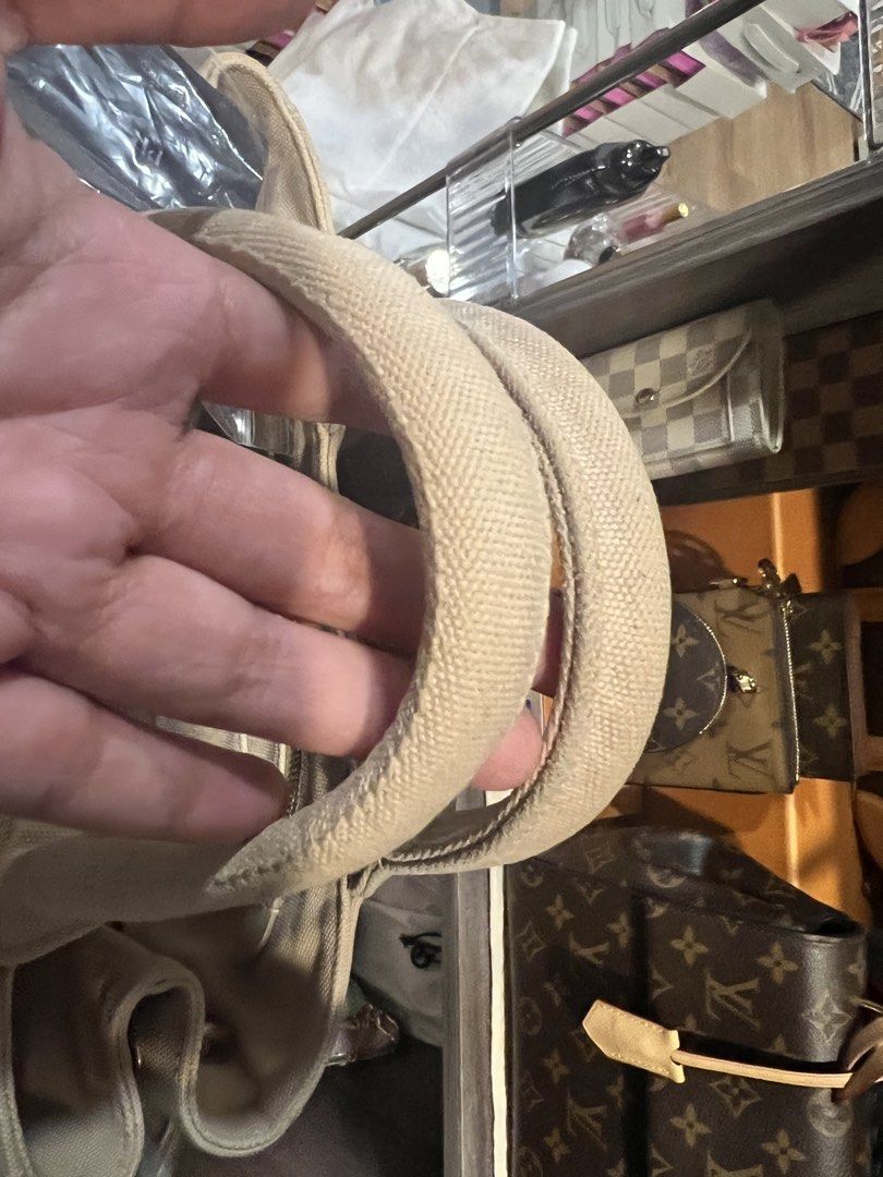 CANAPA (Category: Luxury Bags & Wallets) located in Santa Rosa. Submitted by kendraem (Listing ID 1446739700, Image 3). Description: Authentic prada canapa in beige with studs Very good condition FIRM 18k LP‼️‼️❗️NO MORE HAGGLING Inclusion: generic dustbag , original strap, authenticity card. Personally owned. Not a reseller. I can only ship via lalamove. Location cabuyao laguna. Enjoy! Enjoy!.