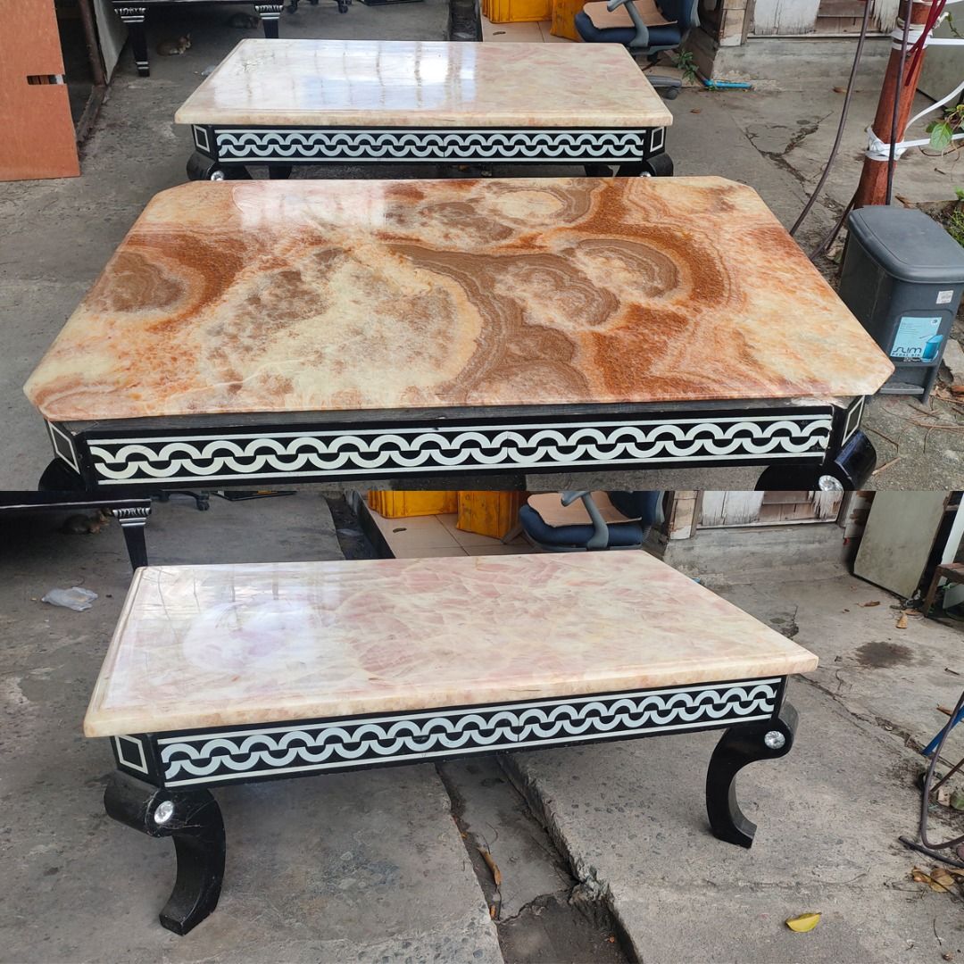 Center table marble top (Category: Tables & Sets) located in Paranaque City. Submitted by goldenwhale.c6c4bd (Listing ID 1446774537, Image 1). Description: - Beautiful marble tops with unique brown and beige patterns - Sturdy black legs with decorative white and black trim around the base - Adds a stylish touch to any living room - Well-made and durable Size: 170 x 90 x 53 cm.