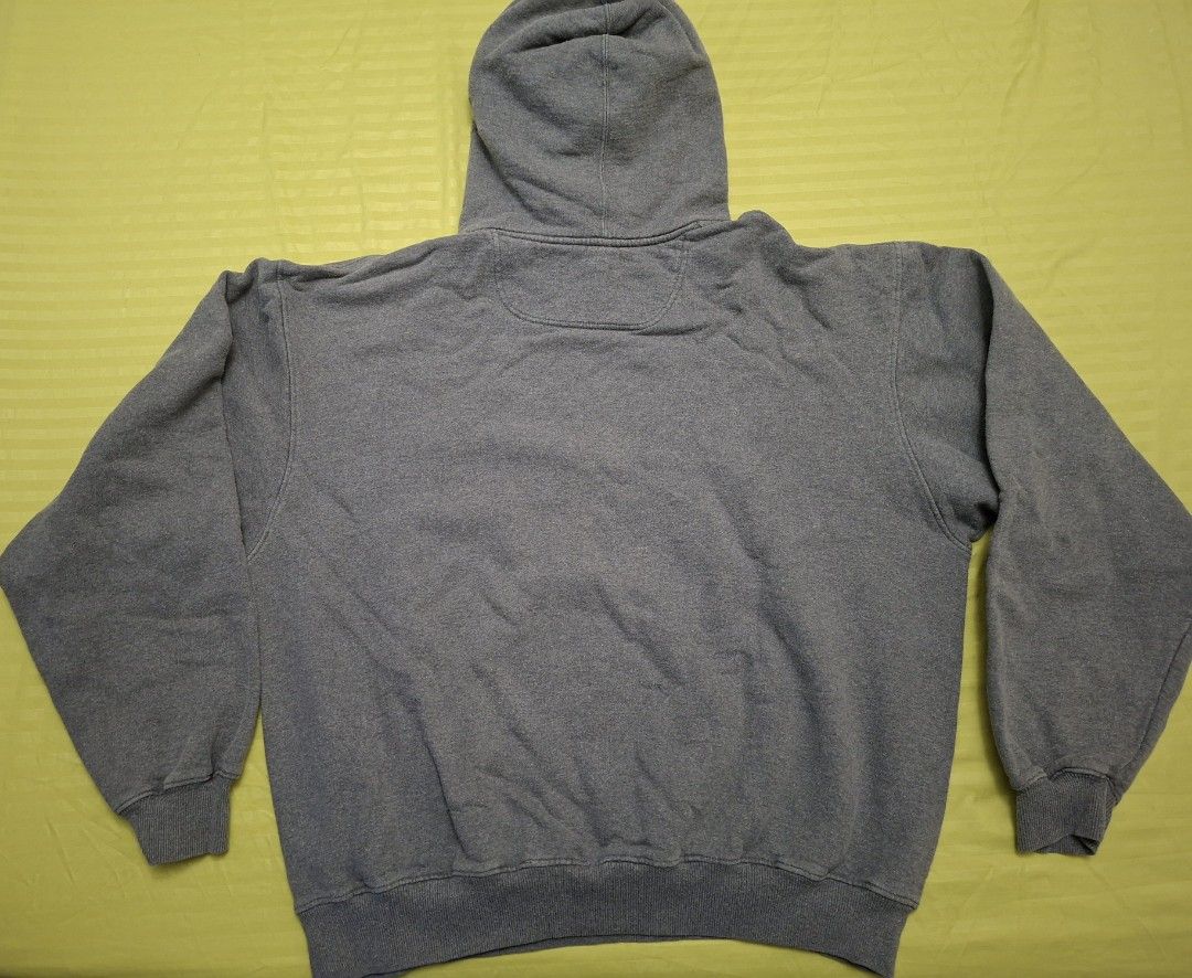 Champion Gray Pull Over Hoodie (Category: Coats, Jackets and Outerwear) located in Antipolo. Submitted by d.tuazon (Listing ID 1446844265, Image 2). Description: This is a Grey Champion Pull Over Hoodie featuring an embroidered logo on the chest.Makapal ang tela.Made in Mexico.Size 25 inches width and 27 inches length.ISSUE:Last picture,may konting tahi sa likod na gasgas at sa hood nya.Price is 450 only.Rizal area.Shipping sagot ng buyer..