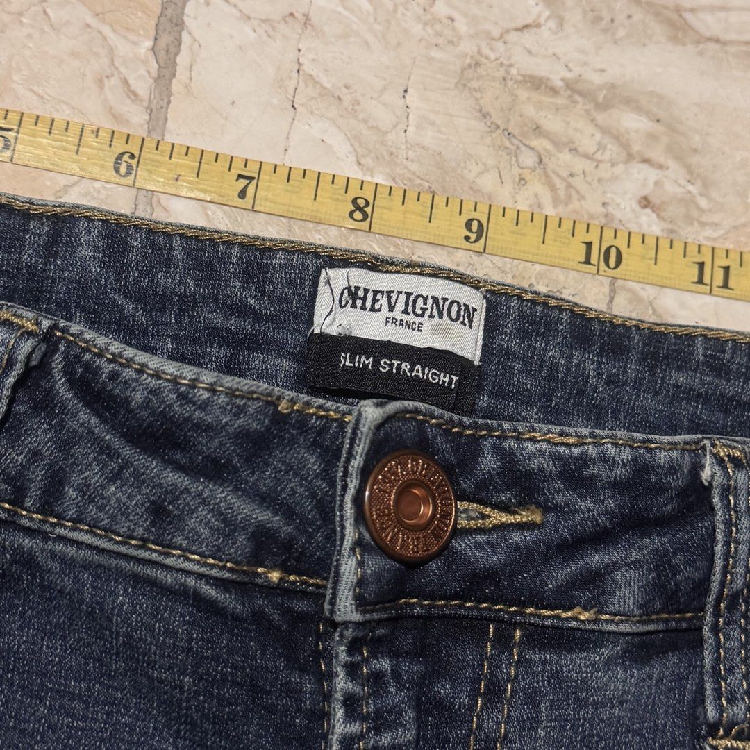 Chevignon Slim Straight Blue Denim Jeans (Category: Jeans) located in Quezon City. Submitted by EveryWANTShop (Listing ID 1446879350, Image 3). Description: - Classic blue denim jeans from Chevignon - Slim straight fit - Distressed details and fading throughout - Button fly closure - Ideal for everyday wear - Measurements available in photos.